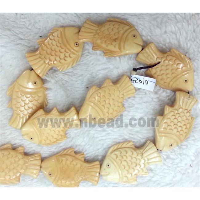 antique cattle bone beads, fish