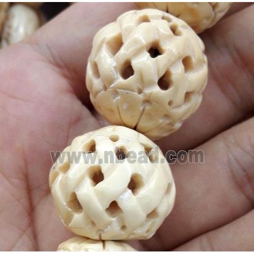 round antique cattle bone bead, yellow