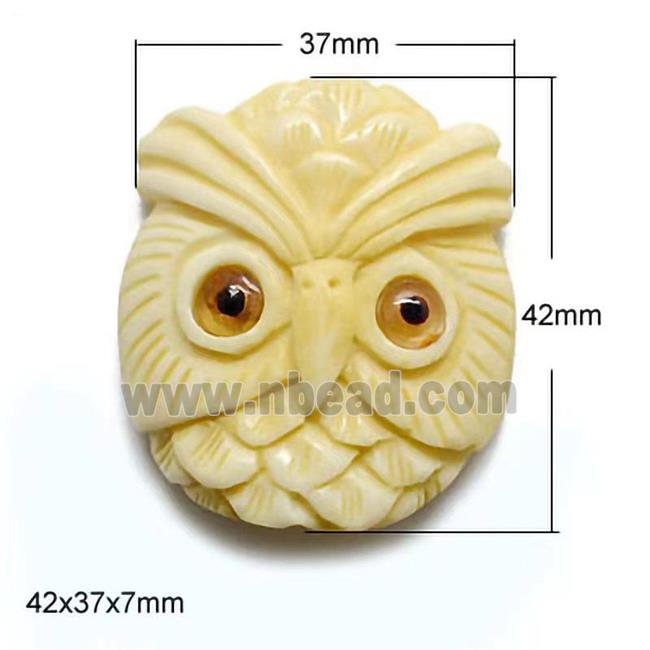 antique cattle bone beads, yellow, owl