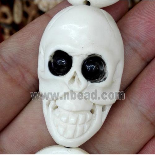 antique cattle bone beads, skull, white