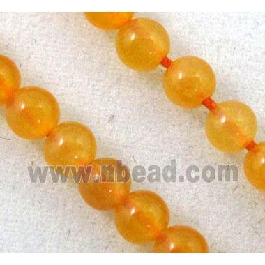 jade bead, tiny, round, orange