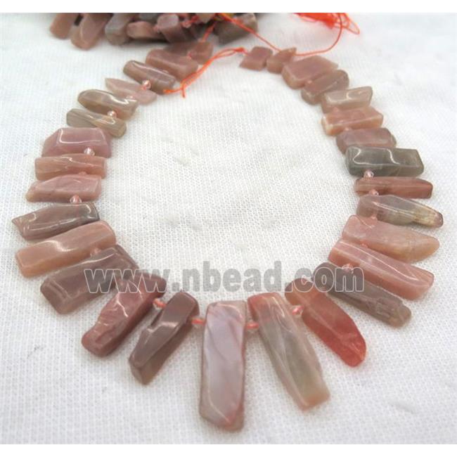 orange MoonStone collar beads, stick