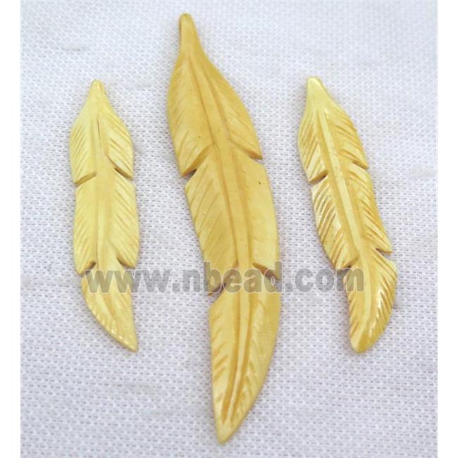 yellow bone feather pendant