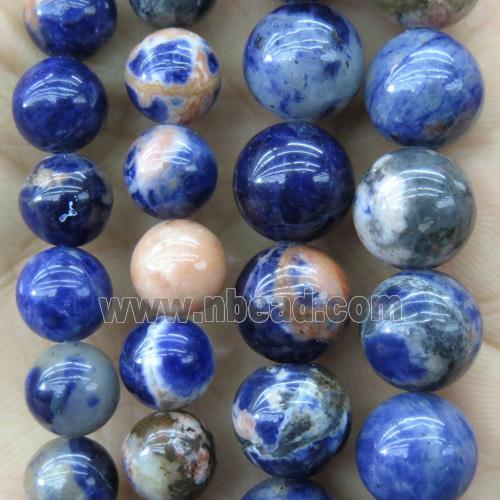 round orange sodalite beads