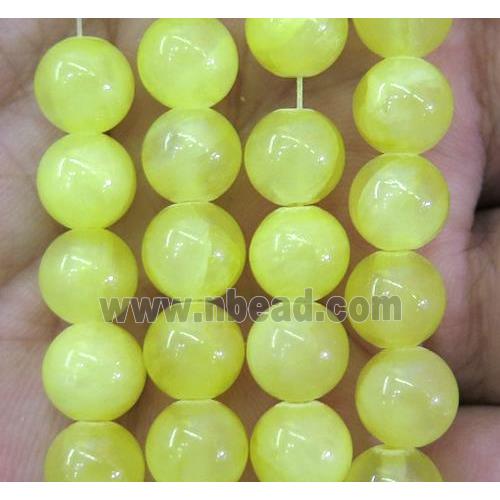 yellow jade bead, round, stabile