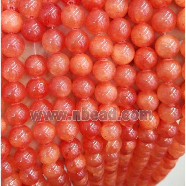 red jade bead, round, stabile