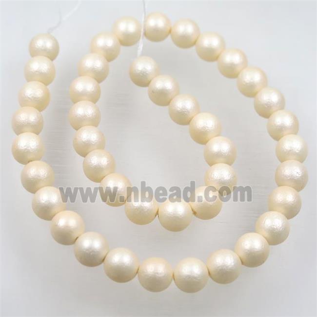 round matte lt.yellow pearlized shell beads