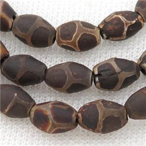 Tibetan Agate rice beads, football, approx 8-12mm, 30pcs per st