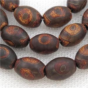 Tibetan Agate rice beads, eye, approx 10-14mm, 24pcs per st