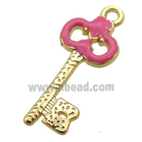 copper Key pendant with hotpink enamel, gold plated
